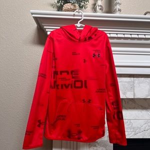 Red Under Armour hoodie.